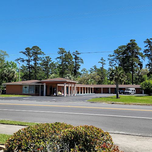 A roadside motel with a sign reading 